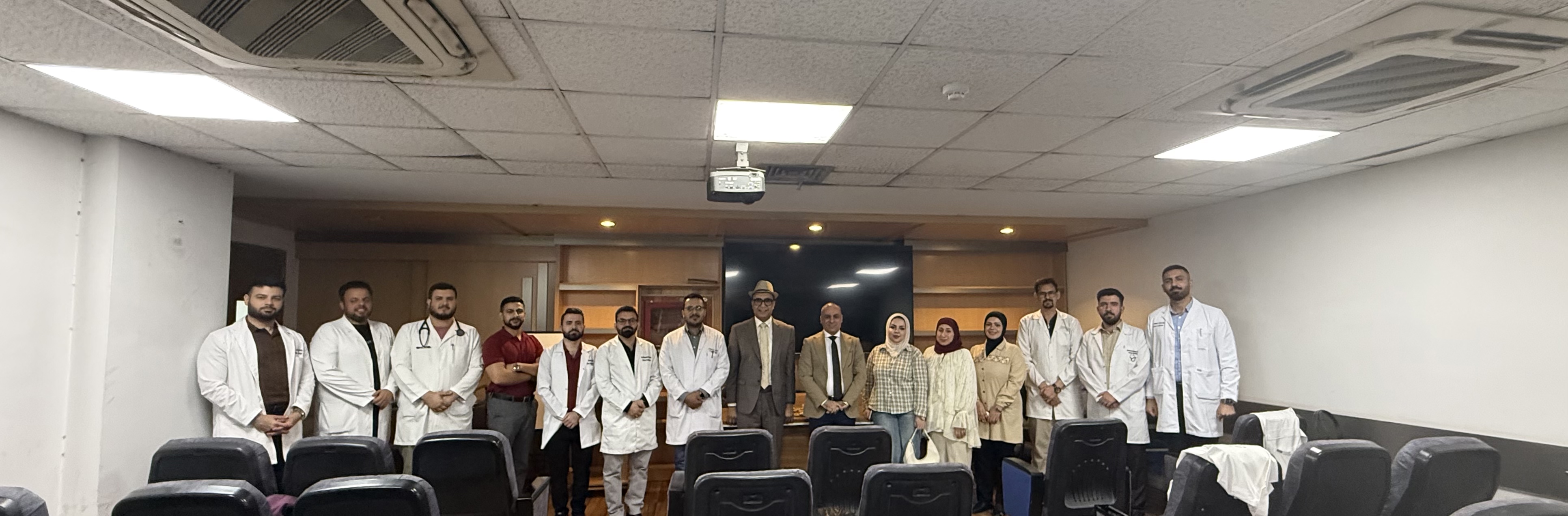 Third-year Clinical Cardiology Board fellows with Dr. Hasan Alfarhan and Dr. Mohammed Ghanem after the cardiac genetics teaching session at Baghdad Teaching Hospital. Photograph supplied by Iraq Cardiology Community.